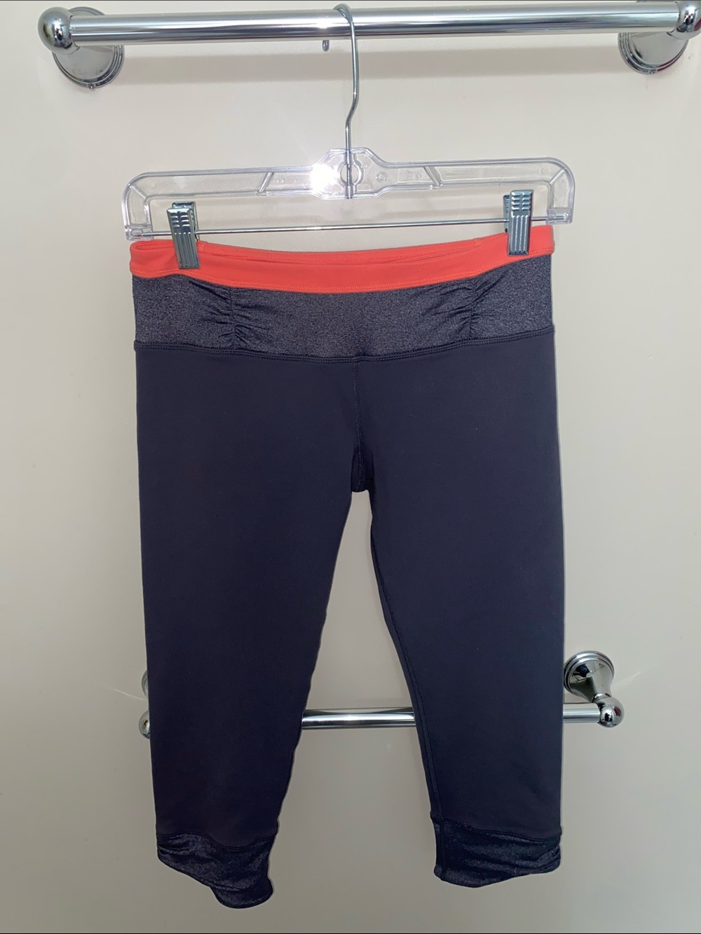 lululemon athletica Black Capri Leggings with Coral Fold-Over Waistband